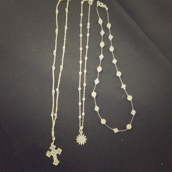 Three goldtone and pearl necklaces