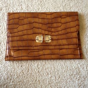 Brown oversized clutch w/thin gold tone strap