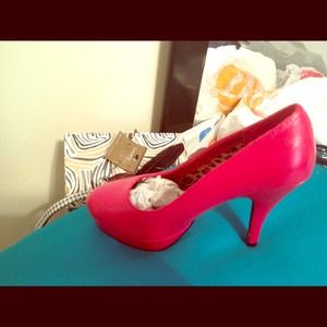 A pair of red pumps