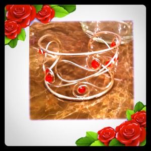 Silver bracelet with red rubies