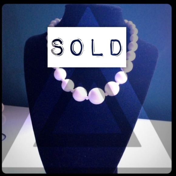 White beaded necklace