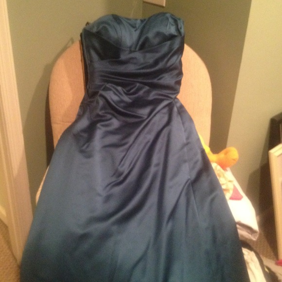 A long dress made by Alfred Angelo.