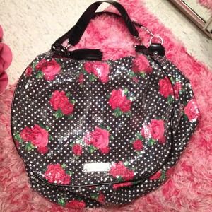 Betsey Johnson floral print satchel.