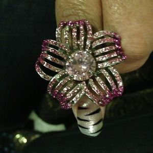 A pink rhinestone ring