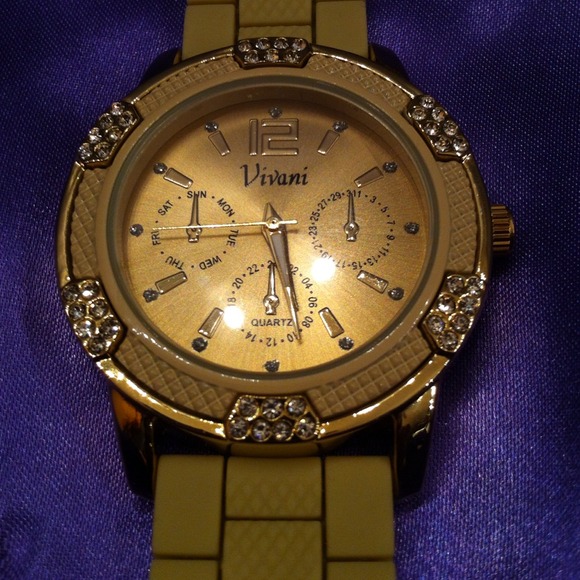 suntan ivory colored watch