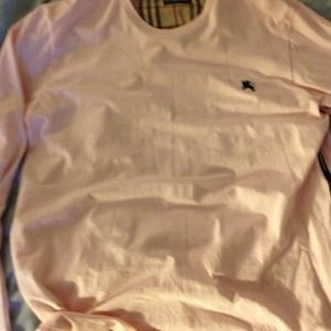 A pink Burberry long sleeve shirt
