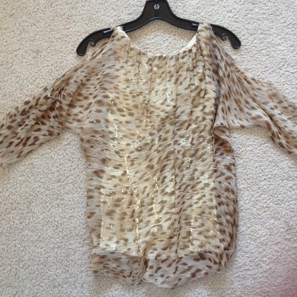 Bailey 44 top with cut out sleeves