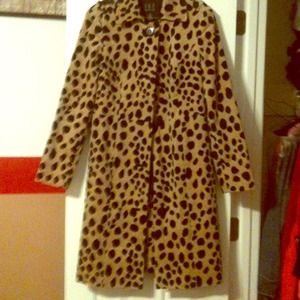 Cheetah print thigh length coat.