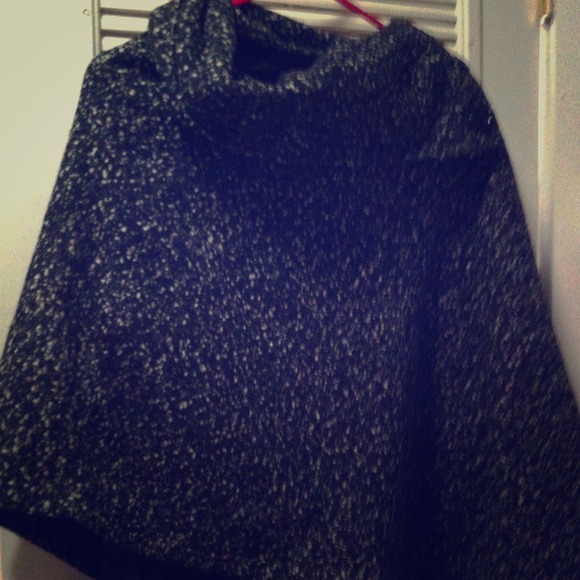Great cowl neck cape with buttons.