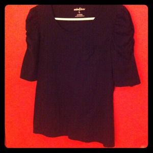 Black blouse with drawn up sleeves
