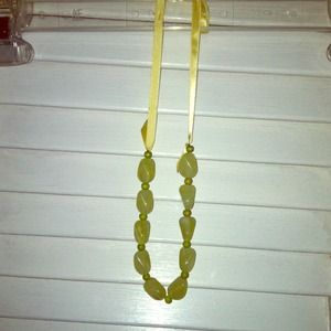 Green necklace on ribbon