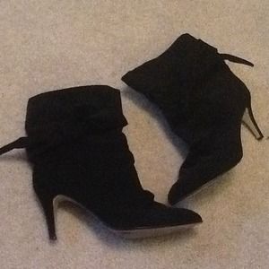 Bitten black suede boots