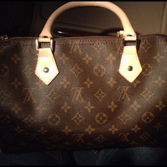 Louis Vuitton large speedy bag W/ lock & key