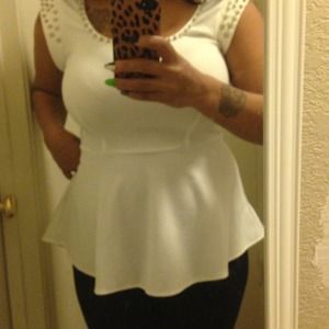 Spiked peplum shirt