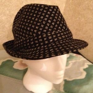 Black women's fedora with sparkly silver pattern.