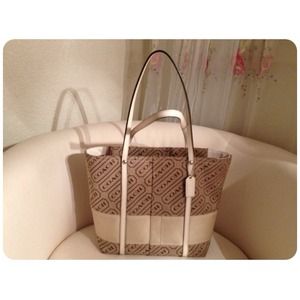 Signature Coach stripe tote purse.