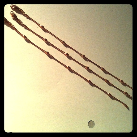 Three golden bracelets!