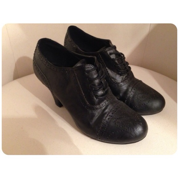 Black Oxford styled heels.
