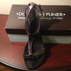 Donald J. Pliner Pewter sandal with one inch heel.