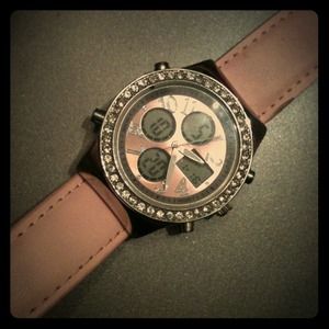 Pink diamond rimmed sports watch