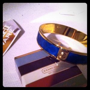 Coach blue/gold bangle bracelet.