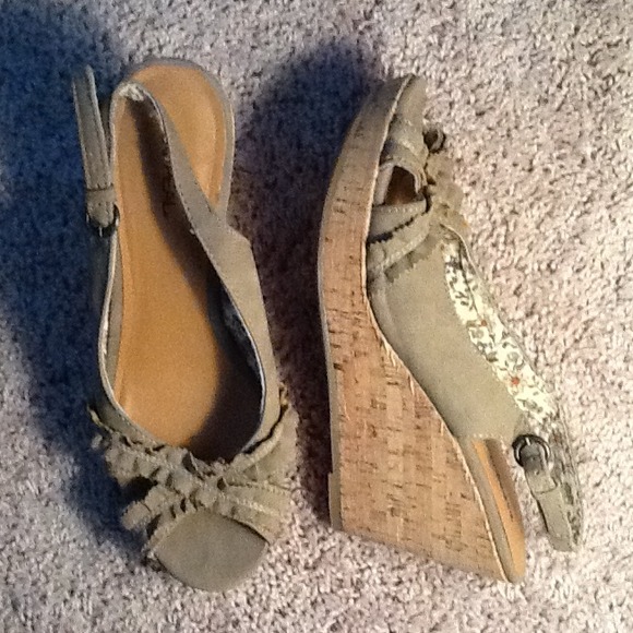 Tan open toed wedges with detail. Black open toe