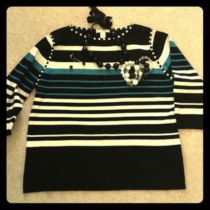 Elegant black, white and blue sweater.