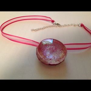 Pink pendant with ribbon