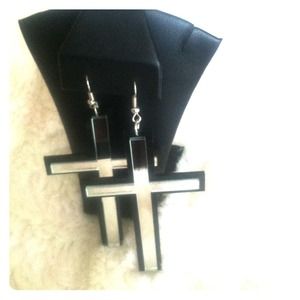 Black mirrored cross earrings.