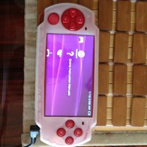 Psp 2000 -God of war Edition..Red handheld console