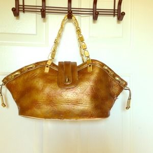 Old Vintage Goldd bronze  Louis Vitton.