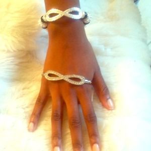 Silver infinity hand bracelet.