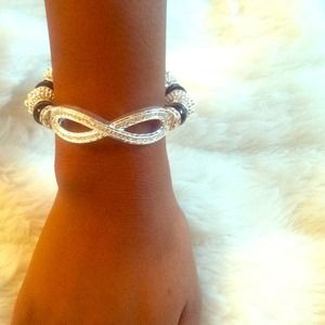 Silver and black infinity bracelet.
