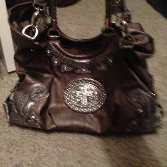 Brown purse with cross