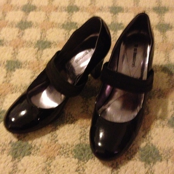 Black patent leather pumps 3" heel, like new.