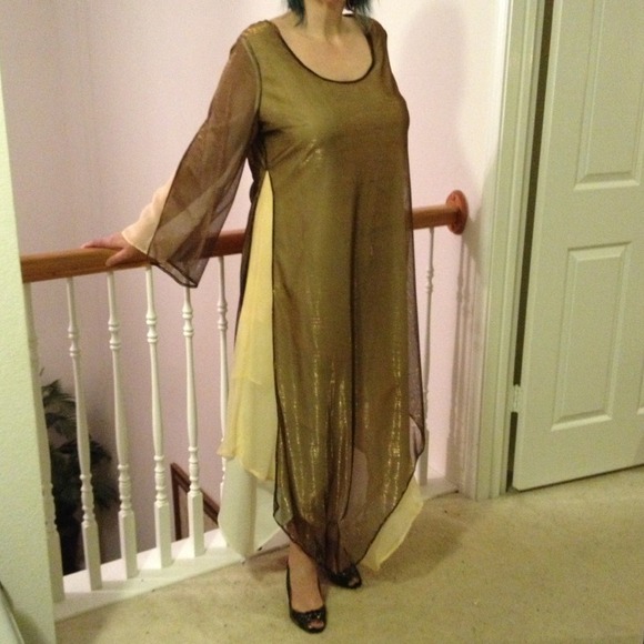 Multi-layered evening dress with asymmetrical hem.