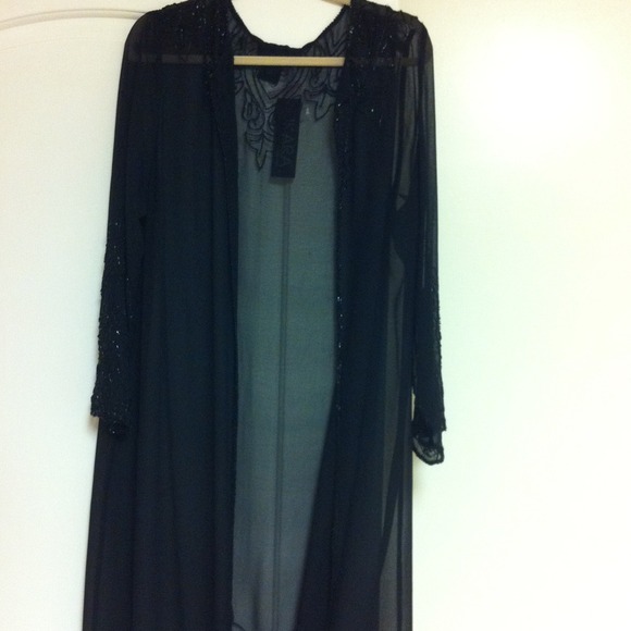 Long black color 1x see thru jacket