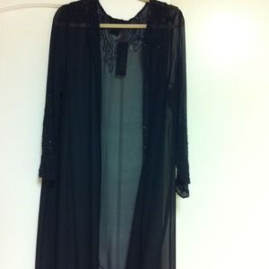 Long black color 1x see thru jacket