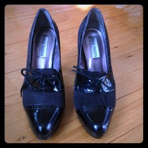 Black Steve Madden Oxford heels.
