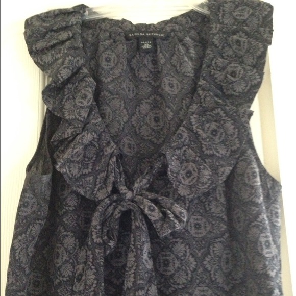 Flowing, patterned navy top with ruffle & bow. - Picture 2 of 3