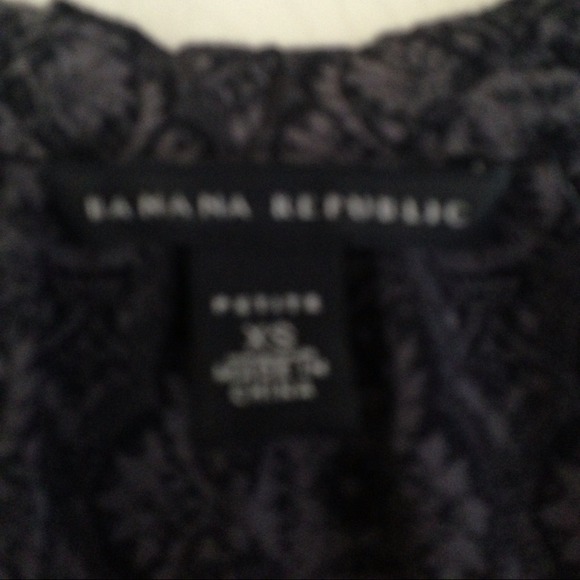 Flowing, patterned navy top with ruffle & bow. - Picture 3 of 3