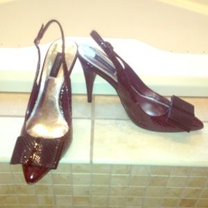 Snake skin pointed toe shoes hardly ever worn.