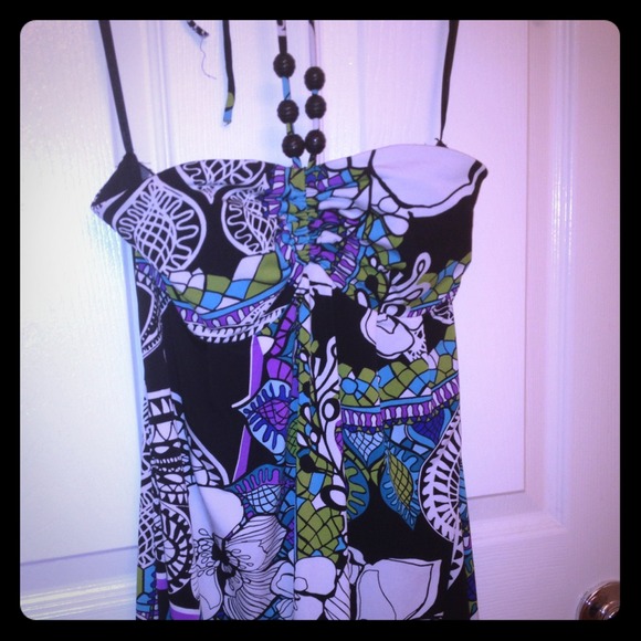 Black with flowers patterns strapless dress.