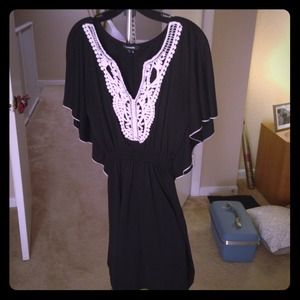 Pretty black tunic/dress with lace detail.