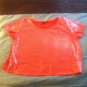 Sequin shirt with cotton back. Super cute.