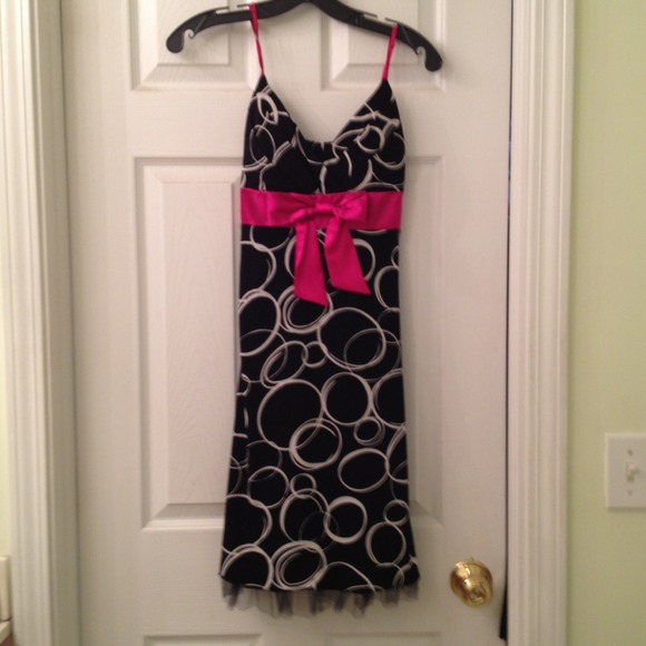 Black white dress with hot pink now and straps.
