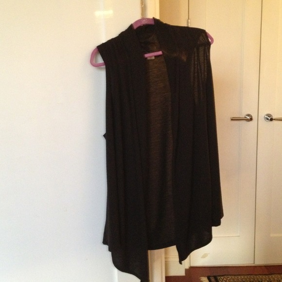 Elegant draping black knit vest.