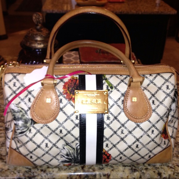 L.A.M.B. handbag comes with original dust bag