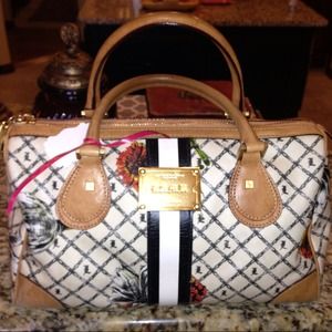 L.A.M.B. handbag comes with original dust bag