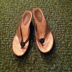 Tan faux leather flip-flop sandals